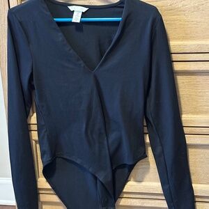 H&M black bodysuit. Stretchy. Knit. Size M